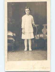 Pre-1930 rppc GIRL IN WHITE DRESS AT CHAIR Embossed Carthage Missouri MO HM3196