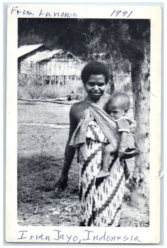 1991 Irian Jaya from Lunows Indonesia Woman Carrying Child Vintage Postcard