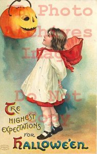 258533-Halloween, IAP No 1237-1, Ellen Clapsaddle,Girl & Jack o Lantern on Wall