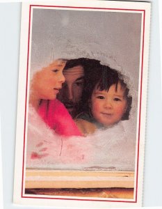 Postcard Window seat on winter's spectacle holds a father and his two sons, AK