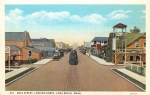 Main Street Scene Steam Train LONG BEACH, WA Railroad c1920s Vintage Postcard