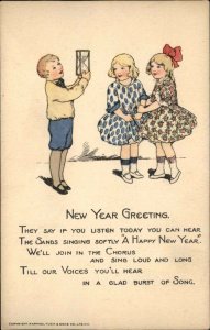 Tuck Joyous New Year Little Girls and Boy c1920 Vintage Postcard