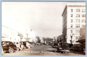 RPPC WHITTIER CALIFORNIA*CA*PHILADELPHIA STREET*GALLENKAMPS STORE*OLD CARS