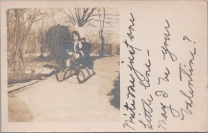 RPPC Postcard Little Girl Sledding Down a Hill in Snow 1906