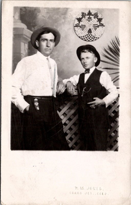 Two Handsome Men Colorado Studio c1910 to Clara in Hoxie Kansas Postcard Z23