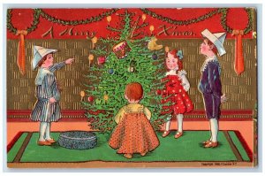 c1910's Merry Christmas Children Decorated Christmas Tree Embossed Postcard