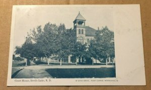 VINTAGE USED  1908 PENNY POSTCARD COURT HOUSE  DEVIL'S LAKE N. DAK.