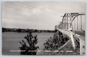 RPPC~Muscatine Iowa~Mississippi River Scene~Bridge~Car~Skyline~c1950 Postcard