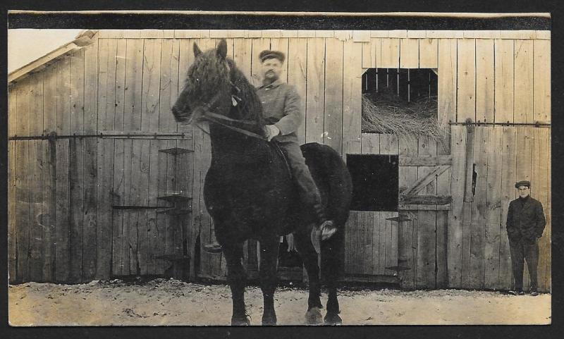 Man on Horse in Front of Barn RPPC Unused c1910s