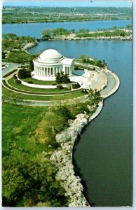 The Jefferson Memorial crowns the Tidal Basin abloom with cherry trees - D. C.
