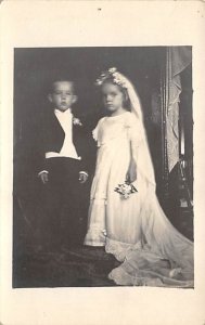 Little boy and little girl dressed up as bride and groom Adults & Children Wr...