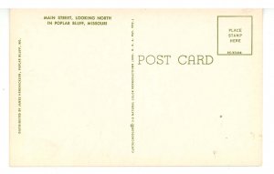 MO - Poplar Bluff. Main Street looking North ca 1959