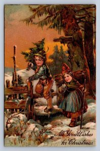 J92/ Merry Christmas Holiday Postcard c1910 Kids Cutting Tree Forest 225