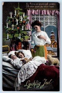 Christmas Postcard Mother Seeing Children Sleeping Teddy Bear c1910's Antique