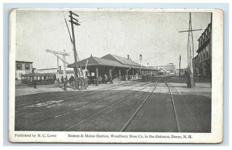 DERRY NH Boston & Maine Railroad Station showing Woodbury Shoe Co In Distance