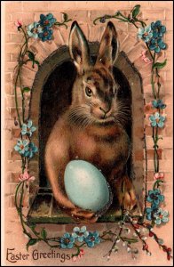Easter Rabbit Holding Egg