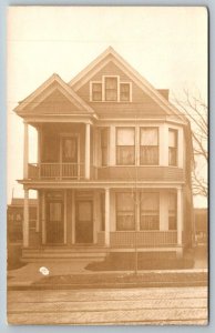 RPPC  Victorian House With Railroad Cars Behind It  Real Photo c1910 Postcard