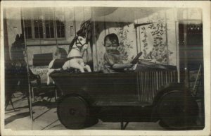 Boy on Amusement Park Car Ride Merry-Go-Round Old Real Photo Postcard