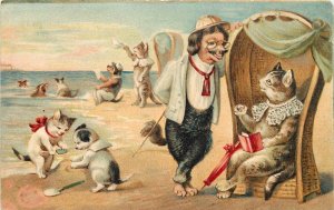 Embossed Postcard Dressed Dog Chats Up Mother Cat while Kittens Play on Beach