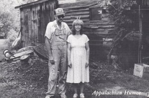 Humour Appalachian Humour Couple In Front Of Cabin