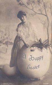 RP: EASTER, 1900-1910; A Happy Easter, Woman Standing By Huge Egg With Rabbit