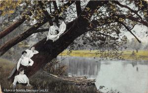 Chautauqua Lake New York~Bunch of Beauties on Tree Trunk~Boat in Water~c1910 Pc