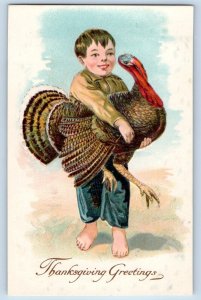 Thanksgiving Postcard Greetings Boy With Turkey Winsch Back Embossed c1910's