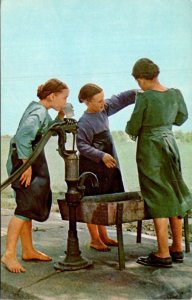 Pennsylvania Amish Country Amish Girls Enjoying Drink Of Water
