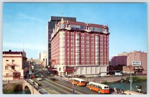 1960's RENO NEVADA MAPES HOTEL CASINO ORANGE & WHITE BUSES VINTAGE POSTCARD