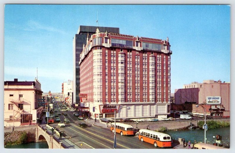 1960's RENO NEVADA MAPES HOTEL CASINO ORANGE & WHITE BUSES VINTAGE POSTCARD