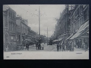 Wales CARDIFF Queen Street showing SHAVING PARLOUR, TRAMS c1902 UB Postcard