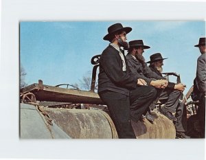 Postcard Amish men resting on a field roller, The Penna. Dutch Country, PA