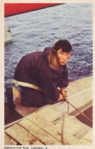 Eskimo Smoking On A Boat in Labrador Canada Vintage Postcard