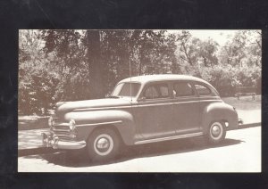 1947 PLYMOUTH 4 DOOR SEDAN CAR DEALER VINTAGE ADVERTISING POSTCARD '47 MOPAR
