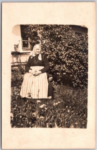 Woman At The Flower Garden Sitting Sunny Day Photograph Postcard