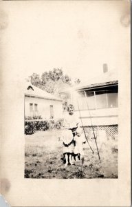 RPPC Children in Yard Girls with Face Masks or Disfigurement Photo Postcard H29