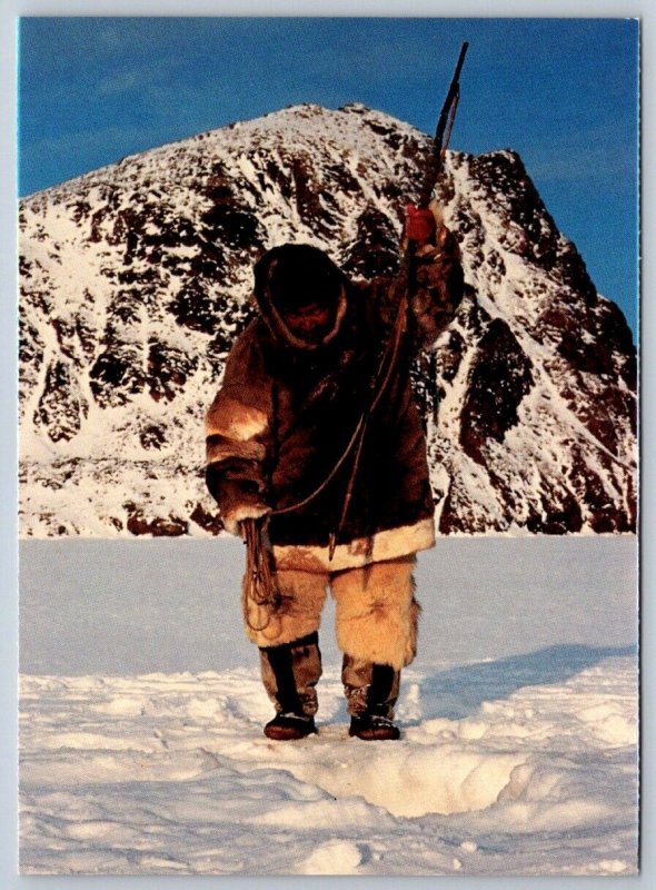 Hunter Spearfishing At Broughton Island, Baffin Island, Nunavut Canada ...