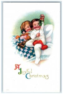 c1910's Joyful Christmas Children With Doll Embossed Posted Antique Postcard