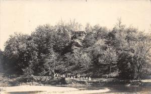 Hopkinton Iowa~Wild Cat Rocks along River~Note Back (Mentions Scene)~1912 RPPC