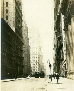 Postcard RPPC Street View showing Trolleys and Men wearing Hats in New York City