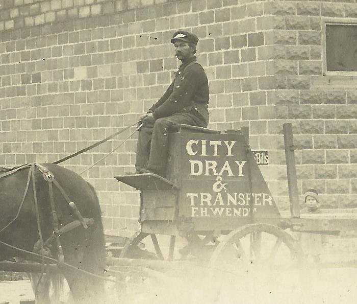 New Ulm MINNESOTA RPPC c1910 F.H. WENDT DRAY DELIVERY WAGON Street Scene