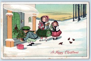 1912 Christmas Children With Toys Little Christmas Tree Winter Scene Postcard