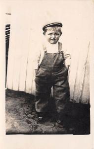 Young boy by a fence Child, People Photo Unused 