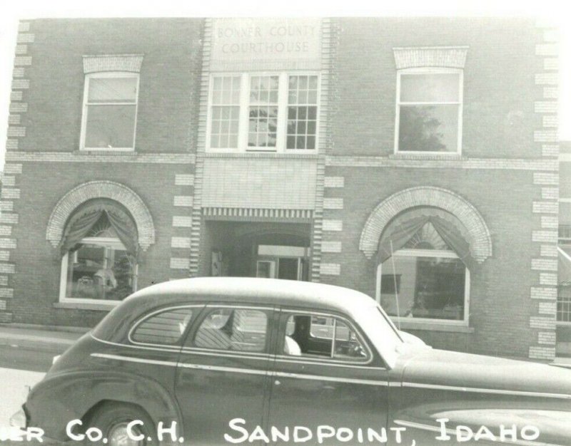 Vtg Postcard RPPC Sandpoint Idaho ID Bonner County Courthouse Street View Car