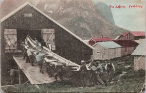 Norway Norge Fra Lofoten Femboring Men Canoe c1909 Postcard G84 *as is