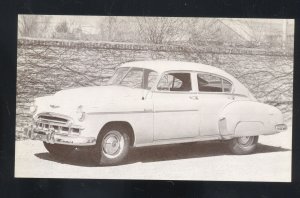 1949 CHEVROLET FLEETLINE SEDAN VINTAGE CAR DEALER ADVERTISING POSTCARD CHEVY