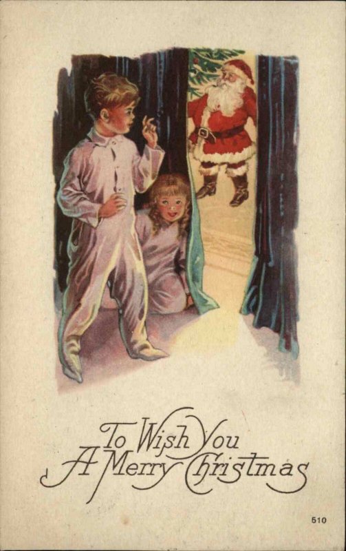 Christmas - Kids Peek Around Corner at Santa Claus #510 c1920 Postcard