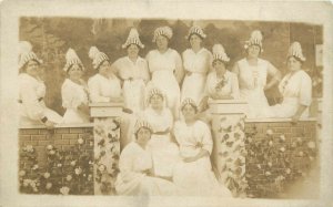 RPPC Group of Women in White Dresses & Patriotic Hats Stars & Stripes US Flag