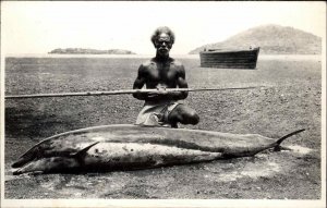 Fiji Native Spear Fisherman Dead Porpoise or Dolphin Real Photo Postcard