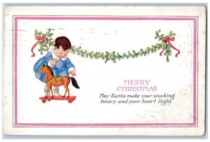 Christmas Postcard Little Girl Playing With Horse Toy Mistletoe Dubuque Iowa IA